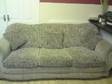 three piece suite sofa and 2 chairs in brown and beige....