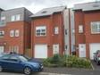 A modern three double bedroom,  three storey semi detached town house presented